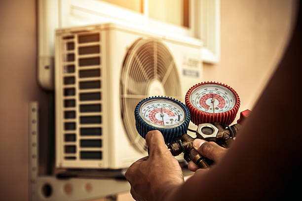 Professional Ac Installation technician working in Highland Park, PA